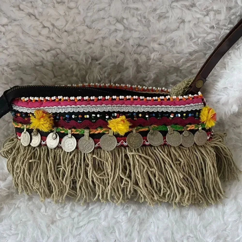 - Elliott Mann Indie multi color clutch with beads and coins accents.